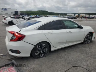 2016 Honda Civic EX-L с VIN 2HGFC1F74GH650713, выставлен на аукционе Copart как лот 58959515 с пробегом Не указан миль и Списание • Salvage title. История ставок и продаж доступна на DreamBid. Изображение 3.
