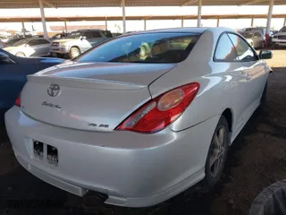 2004 Toyota Camry Solara SE with VIN 4T1CA38P54U005203, listed as a IAAI auction lot 41878752 with 194,959 mi miles. Bid and sale history available at carsss.com. Image 4.