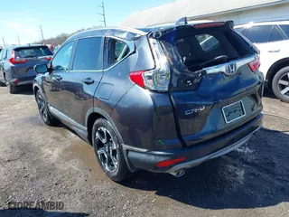 2019 Honda CR-V Touring with VIN 2HKRW1H96KH505447, listed as a IAAI auction lot 41876110 with 56,104 mi miles. Bid and sale history available at carsss.com. Image 3.