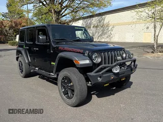 2020 Jeep Wrangler Unlimited Rubicon with VIN 1C4HJXFGXLW234368, listed as a Copart auction lot 54793055 with 56,852 mi miles and Salvage Title. Bid and sale history available at carsss.com. Image 1.