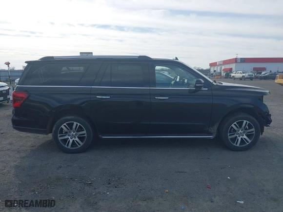 2023 Ford Expedition Max Limited with VIN 1FMJK2A86PEA15903, listed as a IAAI auction lot 41733740 with 57,112 mi miles. Bid and sale history available at carsss.com. Image 14.