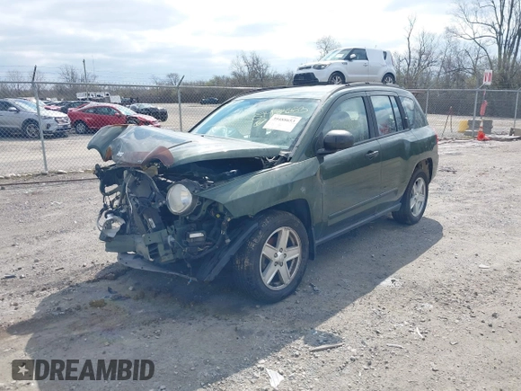 2008 Jeep Compass Sport with VIN 1J8FT47088D714924, listed as a IAAI auction lot 39488653 with 85,964 mi miles. Bid and sale history available at carsss.com. Image 2.