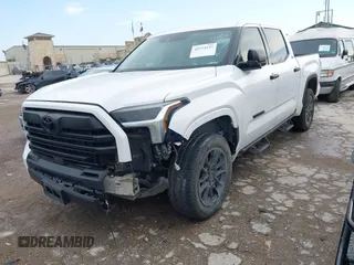 2023 Toyota Tundra SR5 with VIN 5TFLA5DB0PX077679, listed as a IAAI auction lot 42354545 with 31,838 mi miles and . Bid and sale history available at DreamBid. Image 2.