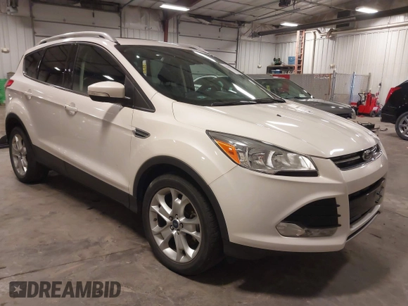 2016 Ford Escape Titanium with VIN 1FMCU9J99GUA61848, listed as a IAAI auction lot 42300324 with 51,692 mi miles and . Bid and sale history available at DreamBid. Image 1.