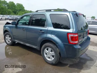2012 Ford Escape XLT z VIN 1FMCU9DG7CKB91272, wystawiony jako IAAI lot #42168619 z przebiegiem 119 011 mil mil oraz . Historia ofert i sprzedaży dostępna na DreamBid. Obrazek 3.