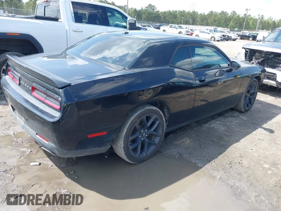 2019 Dodge Challenger SXT z VIN 2C3CDZAG3KH507625, wystawiony jako IAAI lot #41915138 z przebiegiem 125 619 mil mil oraz . Historia ofert i sprzedaży dostępna na DreamBid. Obrazek 4.