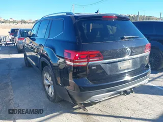 2019 Volkswagen Atlas SE with VIN 1V2LR2CAXKC566024, listed as a IAAI auction lot 41296531 with 106,175 mi miles and . Bid and sale history available at DreamBid. Image 3.