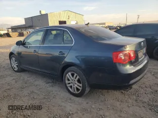 2007 Volkswagen Jetta z VIN 3VWDG71K27M010409, wystawiony jako Copart lot #84155424 z przebiegiem 140 665 mil mil oraz Czysty tytuł • Clean title. Historia ofert i sprzedaży dostępna na DreamBid. Obrazek 2.