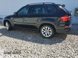 2012 BMW X5 35i with VIN 5UXZV4C58CL753610, listed as a Copart auction lot 53920475 with 145,483 mi miles and Clean title. Bid and sale history available at DreamBid. Image 2.