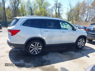 2016 Honda Pilot Touring with VIN 5FNYF6H9XGB005516, listed as a IAAI auction lot 41975049 with 85,217 mi miles. Bid and sale history available at carsss.com. Image 14.
