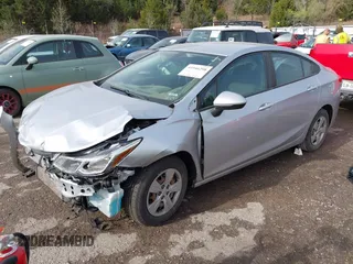 2018 Chevrolet Cruze LS with VIN 1G1BC5SM3J7237242, listed as a IAAI auction lot 41946298 with 65,725 mi miles and . Bid and sale history available at DreamBid. Image 2.