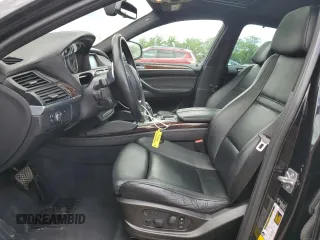 2012 BMW X6 50i z VIN 5UXFG8C51CLZ97393, wystawiony jako Copart lot #58407285 z przebiegiem 128 040 mil mil oraz Szkoda całkowita • Salvage title. Historia ofert i sprzedaży dostępna na DreamBid. Obrazek 7.