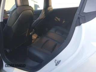 2018 Tesla Model 3 Long Range Battery with VIN 5YJ3E1EA0JF153146, listed as a IAAI auction lot 41621919 with 76,794 mi miles and . Bid and sale history available at DreamBid. Image 8.