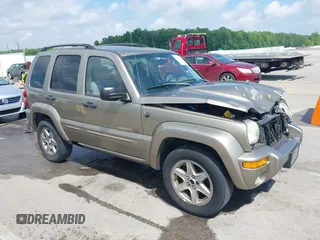 2003 Jeep Liberty Limited z VIN 1J4GL58K63W581296, wystawiony jako IAAI lot #42252437 z przebiegiem 191 041 mil mil oraz . Historia ofert i sprzedaży dostępna na DreamBid. Obrazek 1.