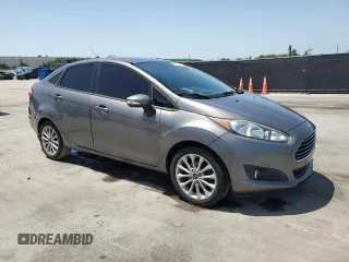 2014 Ford Fiesta SE z VIN 3FADP4BJ4EM110277, wystawiony jako Copart lot #56921115 z przebiegiem 126 536 mil mil oraz Szkoda całkowita • Salvage title. Historia ofert i sprzedaży dostępna na DreamBid. Obrazek 4.