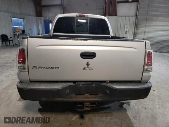 2007 Mitsubishi Raider LS z VIN 1Z7HT28KX7S216386, wystawiony jako Copart lot #88034315 z przebiegiem 162 337 mil mil oraz Czysty tytuł • Clean title. Historia ofert i sprzedaży dostępna na DreamBid. Obrazek 6.
