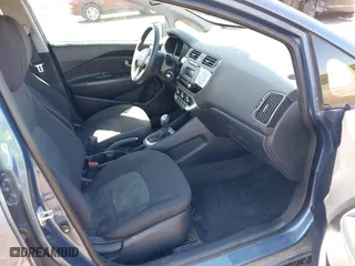 2016 Kia Rio LX with VIN KNADM4A33G6647339, listed as a IAAI auction lot 41964061 with 59,302 mi miles. Bid and sale history available at carsss.com. Image 5.