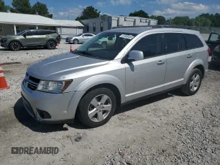 2012 Dodge Journey SXT z VIN 3C4PDDBG3CT360536, wystawiony jako Copart lot #57483455 z przebiegiem 135 278 mil mil oraz Czysty tytuł • Clean title. Historia ofert i sprzedaży dostępna na DreamBid. Obrazek 1.