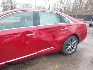 2013 Cadillac XTS z VIN 2G61N5S36D9129188, wystawiony jako IAAI lot #41824147 z przebiegiem 80 985 mil mil oraz . Historia ofert i sprzedaży dostępna na DreamBid. Obrazek 6.