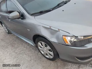 2015 Mitsubishi Lancer ES with VIN JA32U2FU5FU009375, listed as a IAAI auction lot 41933425 with 241,396 mi miles. Bid and sale history available at carsss.com. Image 6.