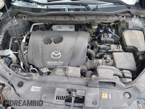 2016 Mazda CX-5 Sport with VIN JM3KE2BE8G0804398, listed as a IAAI auction lot 40490953 with 116,279 mi miles and . Bid and sale history available at DreamBid. Image 10.