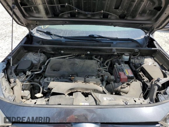 2019 Toyota RAV4 XLE with VIN JTMP1RFV8KD013125, listed as a Copart auction lot 59328465 with 106,947 mi miles and Salvage title. Bid and sale history available at DreamBid. Image 12.