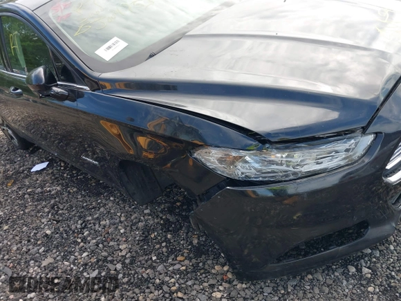 2015 Ford Fusion SE Hybrid with VIN 3FA6P0LU0FR229409, listed as a IAAI auction lot 42272404 with Not provided miles and . Bid and sale history available at DreamBid. Image 6.