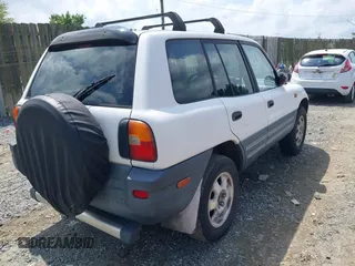 1997 Toyota RAV4 with VIN JT3HP10V2V7037117, listed as a IAAI auction lot 42455431 with 430,346 mi miles and . Bid and sale history available at DreamBid. Image 4.