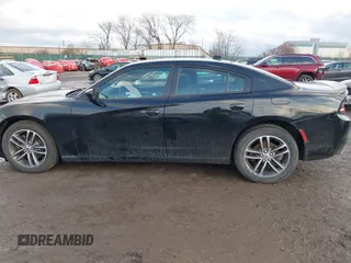 2019 Dodge Charger SXT with VIN 2C3CDXJG3KH630975, listed as a IAAI auction lot 41580174 with 74,575 mi miles and . Bid and sale history available at DreamBid. Image 14.