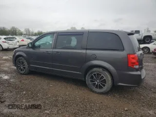 2015 Dodge Grand Caravan SXT with VIN 2C4RDGCG3FR641722, listed as a Copart auction lot 55661285 with 94,140 mi miles and Clean Title. Bid and sale history available at DreamBid. Image 2.