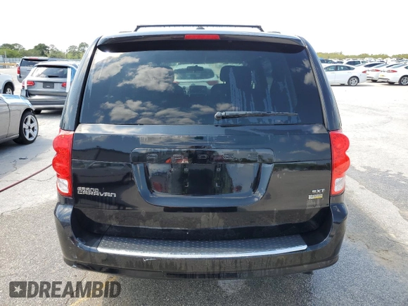 2016 Dodge Grand Caravan SXT with VIN 2C4RDGCG7GR181501, listed as a Copart auction lot 53945545 with 84,738 mi miles and Salvage Title. Bid and sale history available at DreamBid. Image 6.