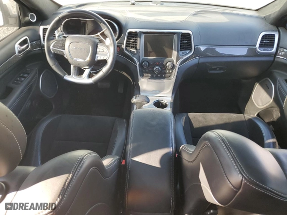 2015 Jeep Grand Cherokee SRT with VIN 1C4RJFDJ4FC625552, listed as a Copart auction lot 77171974 with 114,932 mi miles and Clean Title. Bid and sale history available at carsss.com. Image 8.