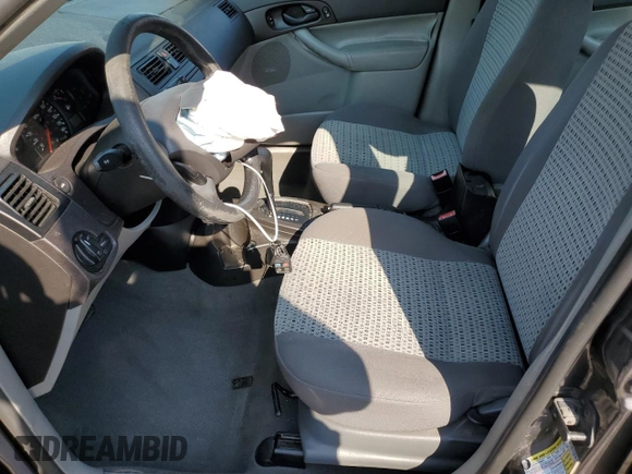 2007 Ford Focus S с VIN 1FAFP34N97W294489, выставлен на аукционе Copart как лот 60376985 с пробегом 155 295 миль миль и Списание • Salvage title. История ставок и продаж доступна на DreamBid. Изображение 7.