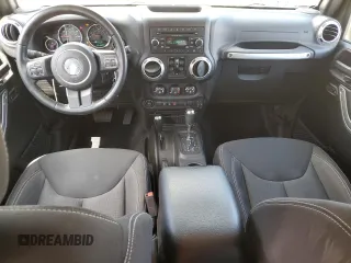 2015 Jeep Wrangler Unlimited Rubicon with VIN 1C4BJWFGXFL752602, listed as a Copart auction lot 54102395 with 26,466 mi miles and Salvage title. Bid and sale history available at DreamBid. Image 8.
