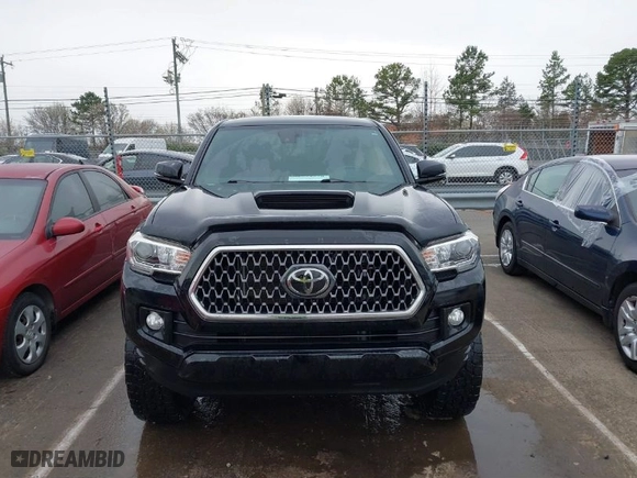2019 Toyota Tacoma 4WD SR with VIN 3TMCZ5AN1KM247618, listed as a IAAI auction lot 41734570 with 68,796 mi miles. Bid and sale history available at carsss.com. Image 12.