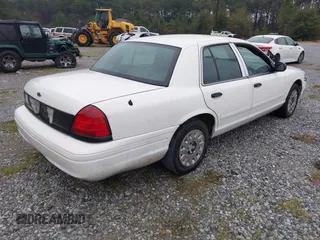 2005 Ford Police Interceptor z VIN 2FAFP71W25X139210, wystawiony jako IAAI lot #41609177 z przebiegiem 114 755 mil mil oraz . Historia ofert i sprzedaży dostępna na DreamBid. Obrazek 4.