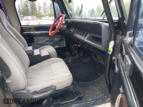 1994 Jeep Wrangler with VIN 1J4FY29S7RP474769, listed as a IAAI auction lot 42283575 with 154,422 mi miles and . Bid and sale history available at DreamBid. Image 5.