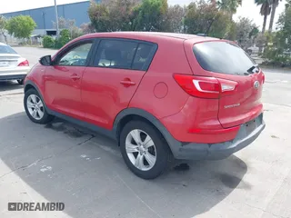 2013 Kia Sportage LX with VIN KNDPBCA26D7355889, listed as a IAAI auction lot 42054415 with 136,859 mi miles. Bid and sale history available at carsss.com. Image 3.