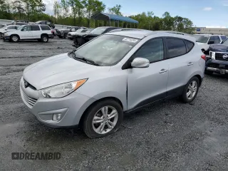 2013 Hyundai Tucson GLS with VIN KM8JU3AC1DU709937, listed as a Copart auction lot 52716295 with 181,711 mi miles and Salvage Title. Bid and sale history available at carsss.com. Image 1.