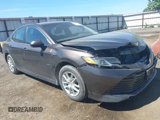 2019 Toyota Camry Hybrid LE z VIN 4T1B31HK3KU514914, wystawiony jako IAAI lot #42370358 z przebiegiem 127 705 mil mil oraz . Historia ofert i sprzedaży dostępna na DreamBid. Obrazek 1.