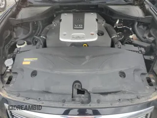 2013 Infiniti M z VIN JN1BY1AR5DM604133, wystawiony jako Copart lot #56890095 z przebiegiem 202 593 mil mil oraz Szkoda całkowita • Salvage title. Historia ofert i sprzedaży dostępna na DreamBid. Obrazek 11.