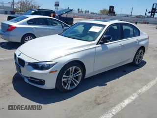 2013 BMW 3 Series 328i xDrive with VIN WBA3B3C56DJ698238, listed as a IAAI auction lot 42333709 with 82,167 mi miles and . Bid and sale history available at DreamBid. Image 2.