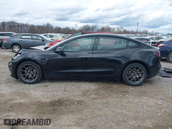 2021 Tesla Model 3 Long Range with VIN 5YJ3E1EB4MF012822, listed as a IAAI auction lot 41918721 with 69,105 mi miles. Bid and sale history available at carsss.com. Image 14.