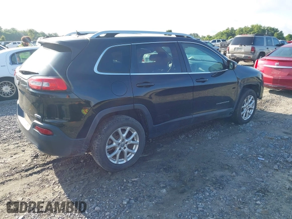 2016 Jeep Cherokee Latitude with VIN 1C4PJLCS7GW206935, listed as a IAAI auction lot 42430585 with 201,629 mi miles and . Bid and sale history available at DreamBid. Image 4.