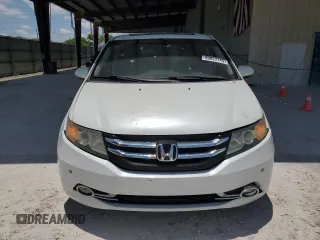 2014 Honda Odyssey Touring z VIN 5FNRL5H9XEB123330, wystawiony jako Copart lot #59023145 z przebiegiem 118 371 mil mil oraz Nie do naprawy • Non repairable. Historia ofert i sprzedaży dostępna na DreamBid. Obrazek 5.