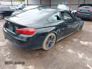2015 BMW 4 Series 428i xDrive with VIN WBA3N5C56FK198340, listed as a IAAI auction lot 42153190 with 96,054 mi miles and . Bid and sale history available at DreamBid. Image 4.