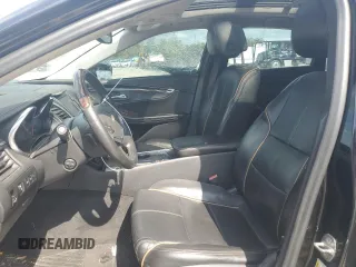2014 Chevrolet Impala LTZ with VIN 1G1155S38EU169167, listed as a Copart auction lot 73174254 with 156,884 mi miles and Salvage Title. Bid and sale history available at DreamBid. Image 7.