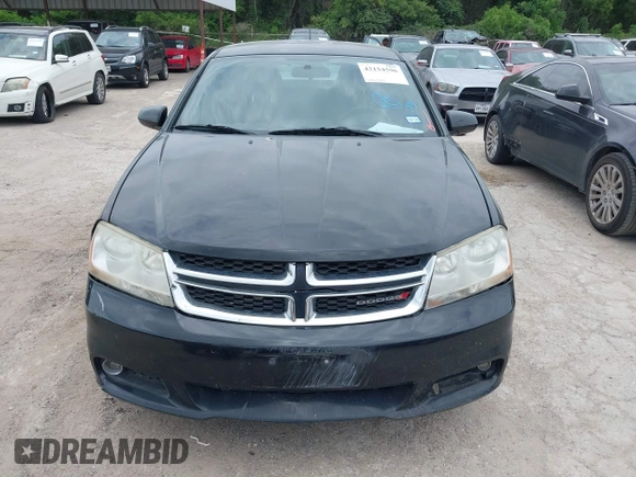 2013 Dodge Avenger SXT with VIN 1C3CDZCB8DN590965, listed as a IAAI auction lot 42154596 with 173,070 mi miles and . Bid and sale history available at carsss.com. Image 6.