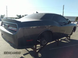 2016 Dodge Challenger SXT with VIN 2C3CDZAG7GH113956, listed as a IAAI auction lot 35633634 with Not provided miles and . Bid and sale history available at DreamBid. Image 4.