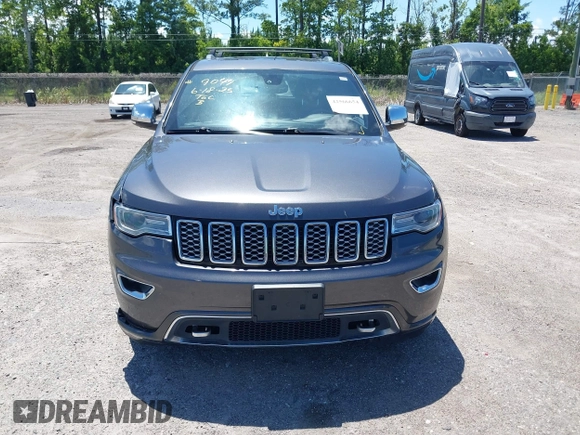 2017 Jeep Grand Cherokee Overland with VIN 1C4RJFCG2HC641791, listed as a IAAI auction lot 42566654 with 116,764 mi miles and . Bid and sale history available at DreamBid. Image 12.